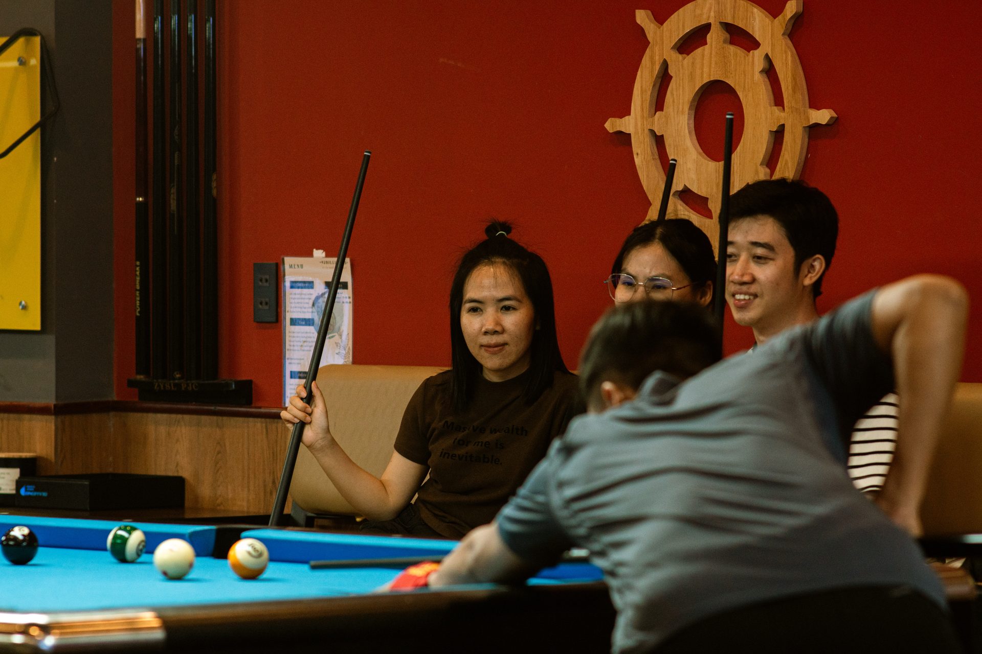 Regulars sharing a laugh together at 92 Billiards Club